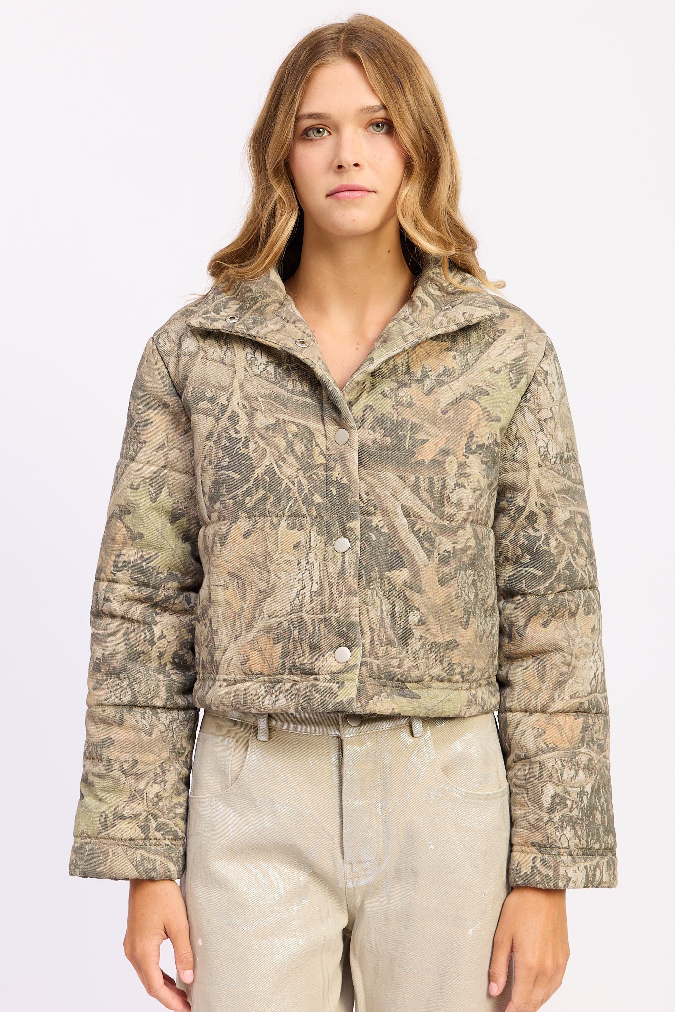 Olive and tan puffer jacket for a warm winter outfit