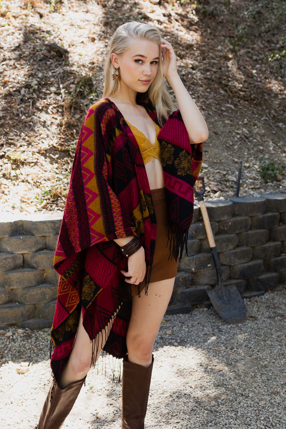 Aztec-inspired poncho with a colorful woven pattern
