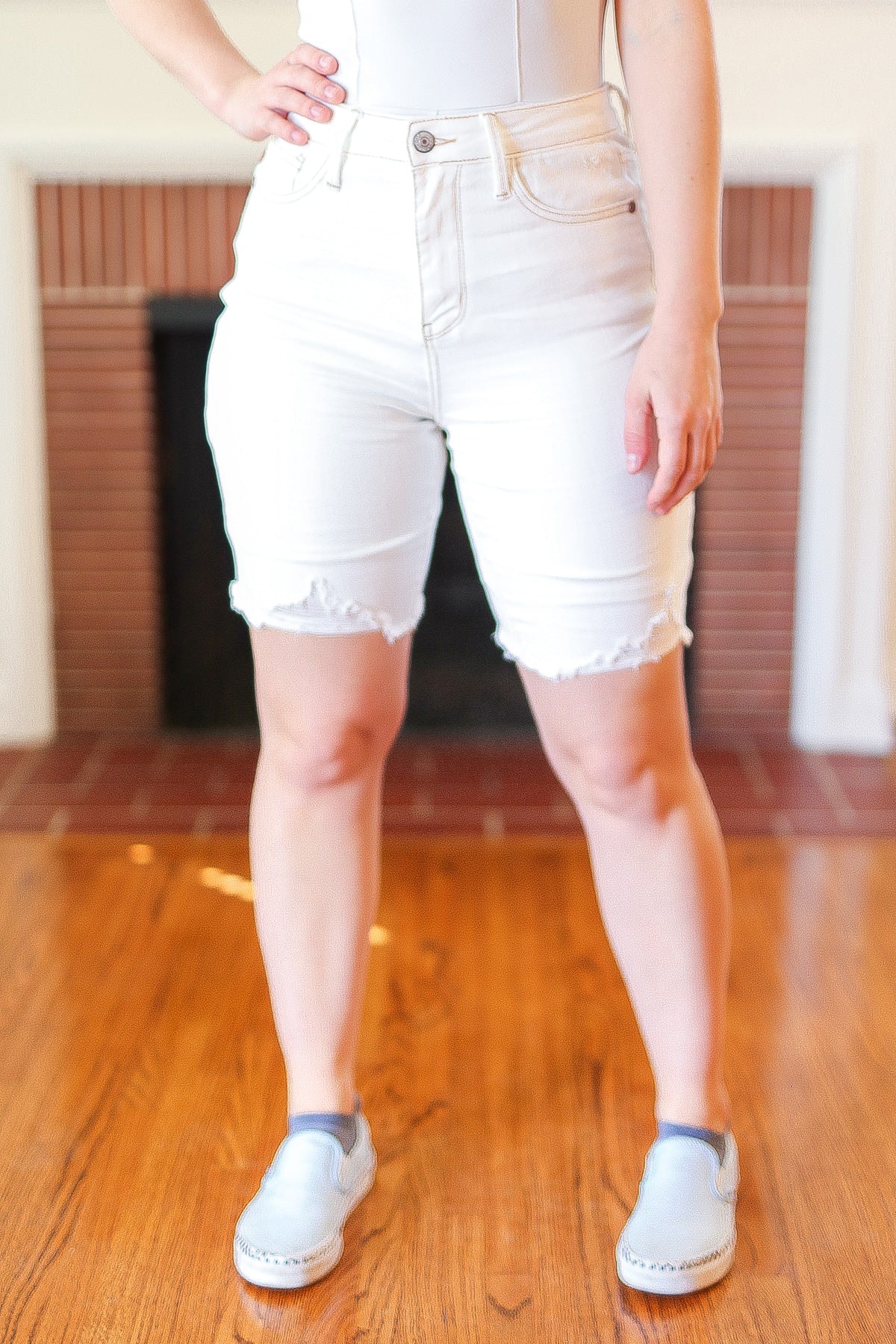 Distressed white bermuda shorts deals