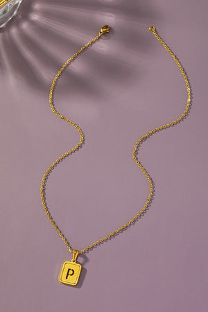 Brass diamond dust cut out initial necklace