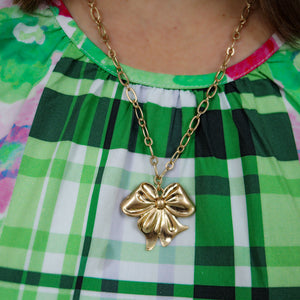 Sasha Bow Pendant Necklace in Worn Gold by CANVAS