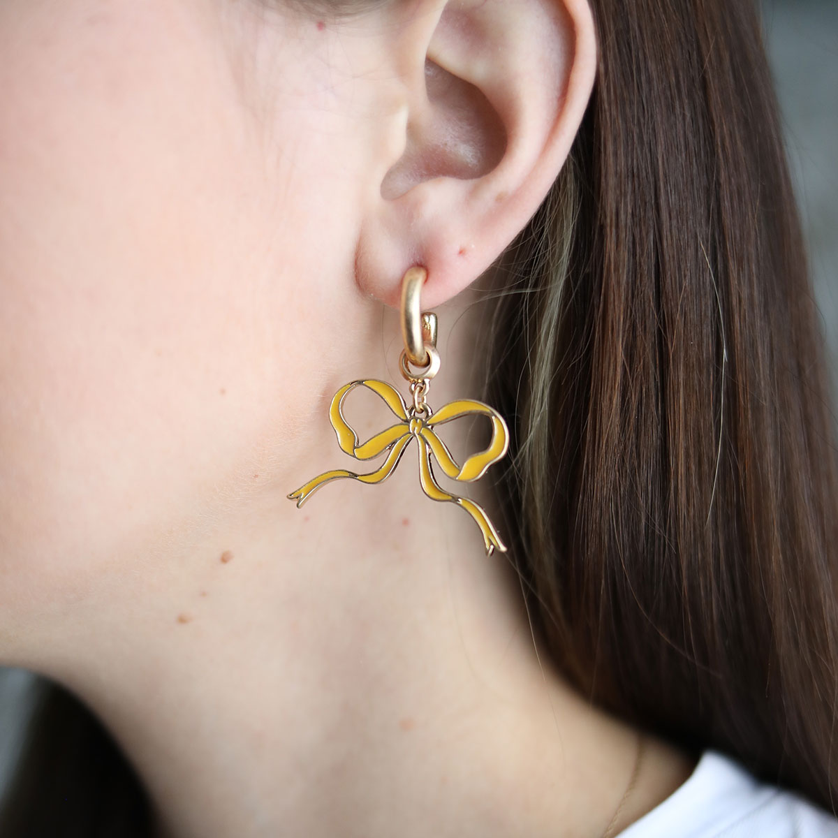 Veronica Game Day Bow Enamel Earrings in Yellow by CANVAS
