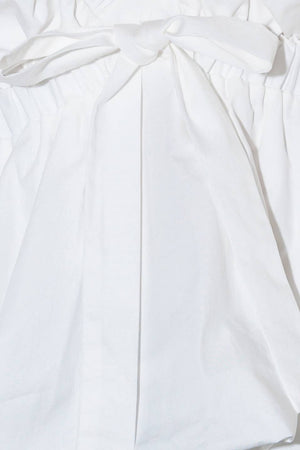 SLOW DOWN IN WHITE WOVEN TOP