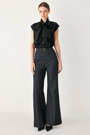 MODERN STATEMENT BOW WOVEN TOP