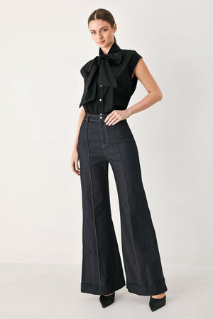 MODERN STATEMENT BOW WOVEN TOP