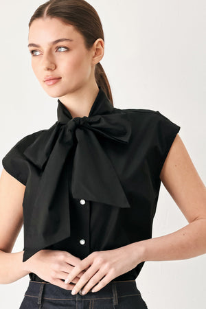 MODERN STATEMENT BOW WOVEN TOP