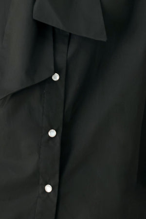 MODERN STATEMENT BOW WOVEN TOP