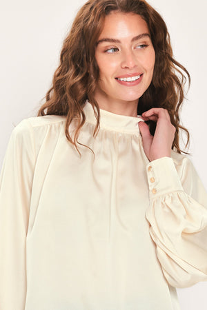 CREAM REFINED HIGH-NECK BLOUSON-SLEEVE TOP