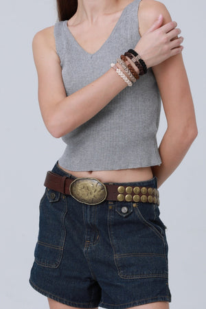 Bold Oval Buckle Belt – Studded Statement Piece