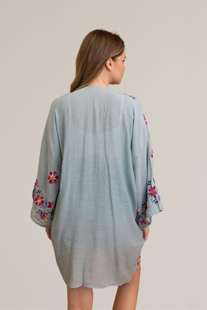 Floral embroidery sage kimono made from viscose and polyester blend.