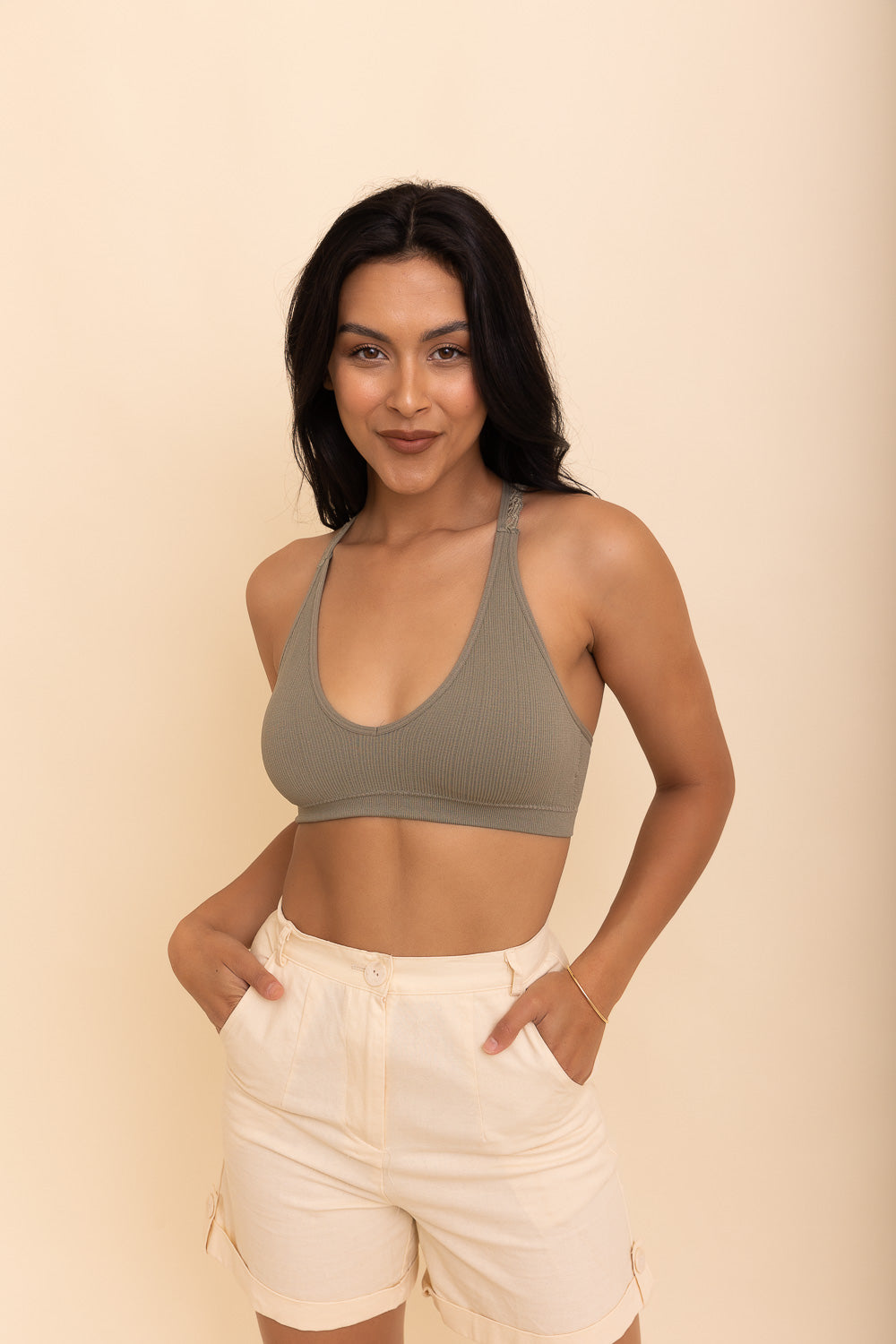 Lacey racerback seamless sage bralette with soft and stretchy lace design.