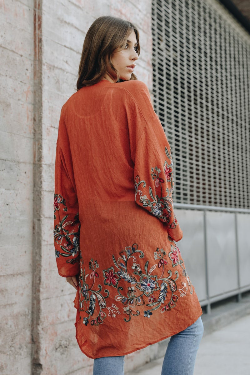 Long rust floral kimono cardigan with lightweight elegant design.
