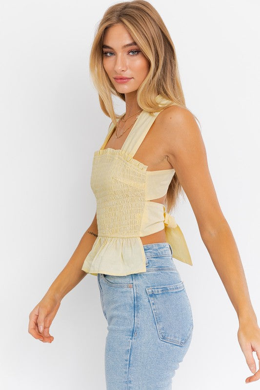 SLEEVELESS SMOCKED PEPLUM TOP LE LIS LEMON L 