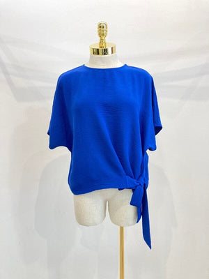 Solid blouse top with round neck and tie up side Miley + Molly 